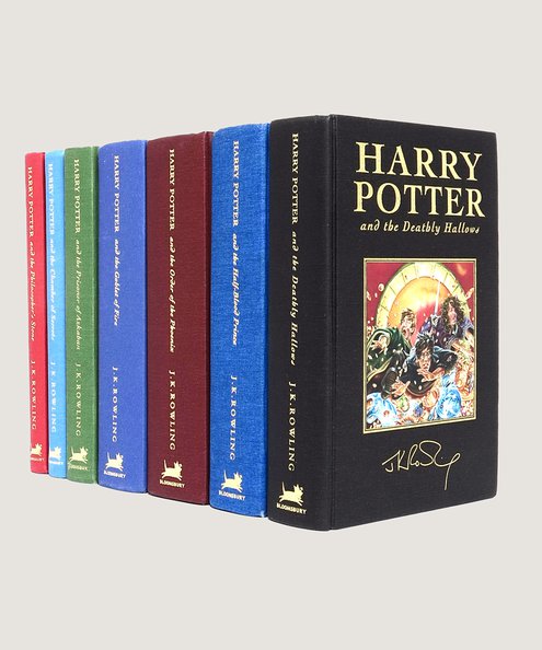  Harry Potter Complete Deluxe Edition Set in Seven Volumes: Harry Potter and the Philosopher’s Stone [with] Harry Potter and the Chamber of Secrets, Harry Potter and the Prisoner of Azkaban (INSCRIBED by Chris Rankin), Harry Potter and the Goblet of Fire, Harry Potter and the Order of the Phoenix, Harry Potter and the Half Blood Prince [and] Harry Potter and the Deathly Hallows.   Rowling, J. K.