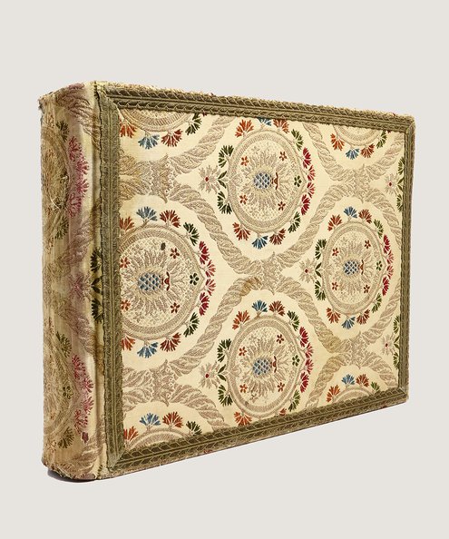  [Substantial photograph album of scenes across Europe in an embroidered binding].  [Amateur female photographer?].