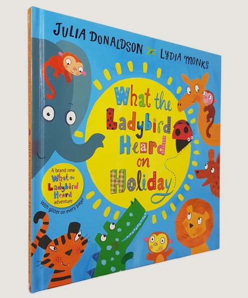  What the Ladybird Heard on Holiday [Signed].  Donaldson, Julia.